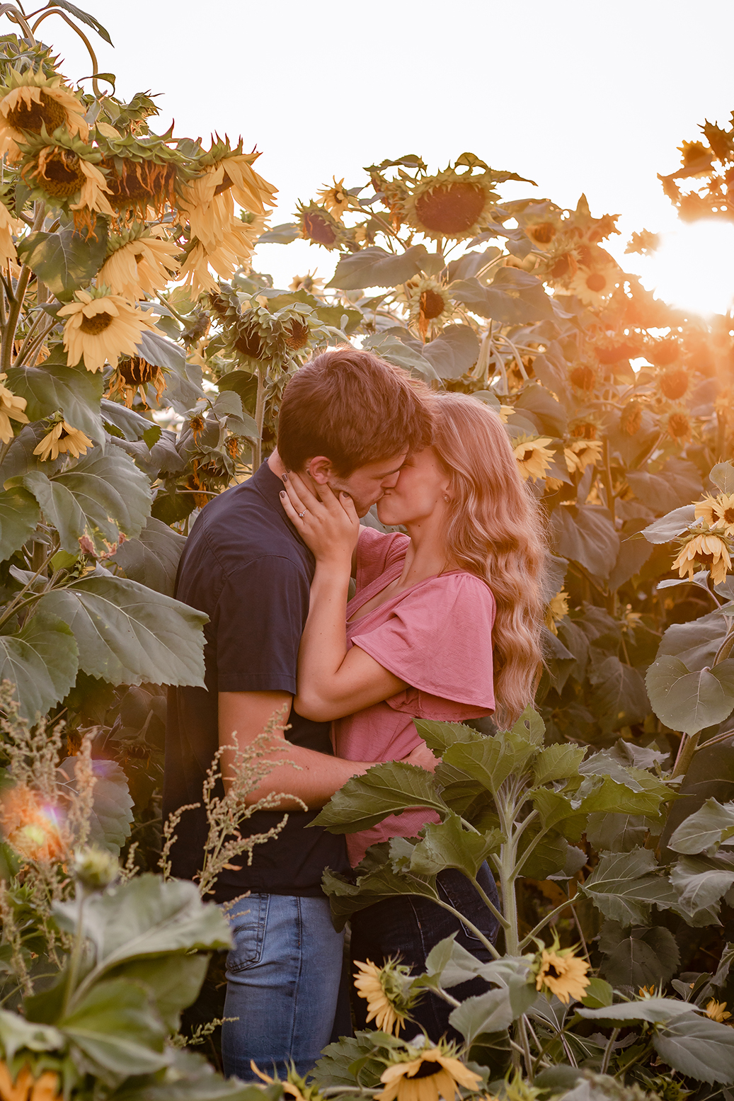 a couple in love standing in flowers